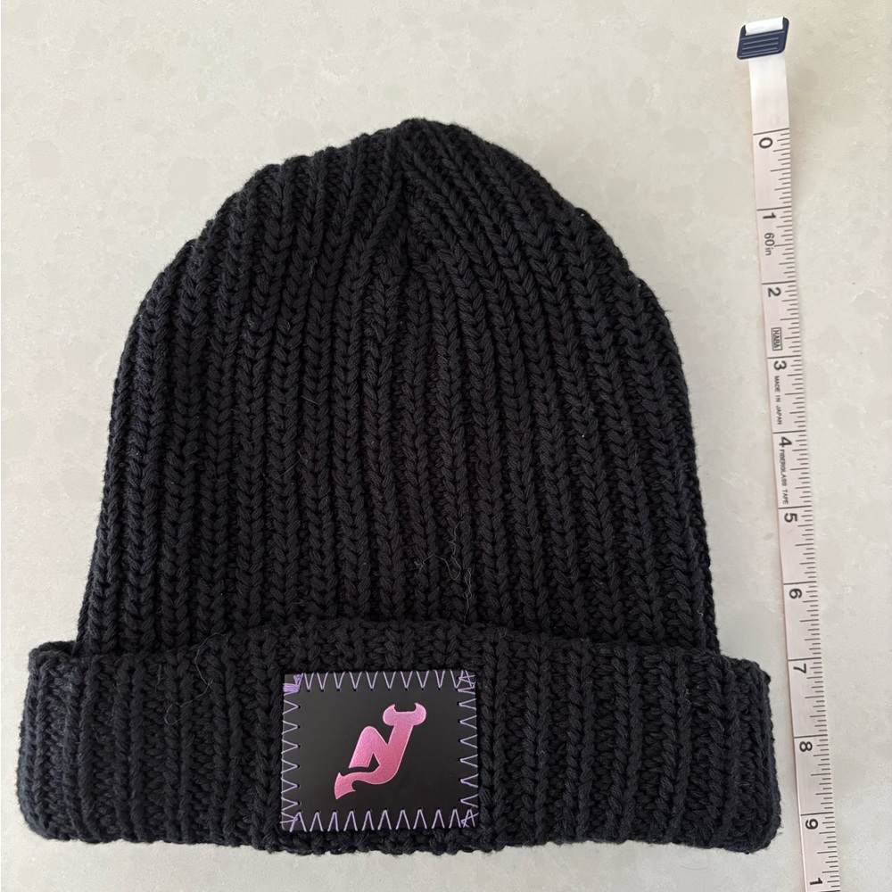 NJ Devils Kids Black Knit Beanie with Purple/Pink Logo.